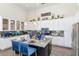 Spacious kitchen island with granite countertops, seating, and modern appliances at 8006 S 38Th Pl, Phoenix, AZ 85042