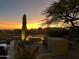 Desert landscape with spa, seating area, and sunset view at 41504 N 107Th Way, Scottsdale, AZ 85262