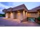 Spacious three-car garage featuring a private driveway and convenient covered access to the main house at 7702 N Moonlight Ln, Paradise Valley, AZ 85253