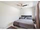 Serene bedroom featuring a queen-sized bed, soft lighting, and neutral decor at 322 N 11Th Pl, Phoenix, AZ 85006