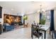 Open-concept living and dining area with modern finishes, neutral tones, and abundant natural light at 322 N 11Th Pl, Phoenix, AZ 85006