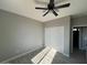 Bedroom features a ceiling fan and a closet at 504 N 297Th Ln, Buckeye, AZ 85396