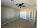 Bedroom features a ceiling fan and a closet at 504 N 297Th Ln, Buckeye, AZ 85396