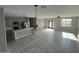 Open-concept kitchen featuring stainless steel appliances and a spacious island at 504 N 297Th Ln, Buckeye, AZ 85396
