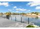 Peaceful lake view with clear skies and waterfront homes from a modern patio at 5439 S Lighthouse Ln, Tempe, AZ 85283