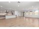 Modern kitchen with gray cabinets, quartz countertops, and stainless steel appliances at 7386 W Bent Tree Dr, Peoria, AZ 85383