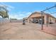 Spacious backyard, covered patio, and storage shed at 14727 N Gil Balcome N Ct, Surprise, AZ 85379