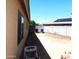 Backyard view with part of house and block wall at 14727 N Gil Balcome N Ct, Surprise, AZ 85379