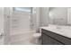 Bright bathroom with a tub and shower combo with a single sink vanity at 2851 N Coronado Dr, Florence, AZ 85132