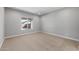 Neutral bedroom with carpet flooring and a window letting in ample natural light at 2851 N Coronado Dr, Florence, AZ 85132