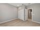 Carpeted bedroom with a closet and light grey walls at 2851 N Coronado Dr, Florence, AZ 85132