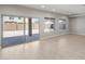 Spacious living room with a sliding glass doors and large windows providing ample natural light at 2851 N Coronado Dr, Florence, AZ 85132
