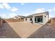 Expansive backyard with privacy fence and covered patio, perfect for entertaining and relaxation at 2868 N Coronado Dr, Florence, AZ 85132