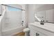 Bathroom featuring a shower-tub combo and a modern vanity with black accents at 2868 N Coronado Dr, Florence, AZ 85132