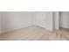 A bright bedroom with neutral carpet, fresh white walls, and a double door closet at 2868 N Coronado Dr, Florence, AZ 85132