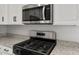 Stainless steel microwave and stove at 2868 N Coronado Dr, Florence, AZ 85132