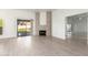 Living room with a stone fireplace and hardwood floors at 4062 E Round Hill Dr, Phoenix, AZ 85028