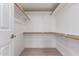 Large walk-in closet with double hanging rods and shelving at 4062 E Round Hill Dr, Phoenix, AZ 85028