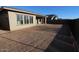 Large backyard with a covered patio, perfect for outdoor entertaining and relaxation at 32535 N 135Th Dr, Peoria, AZ 85383