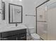 Bathroom with sleek vanity, modern fixtures, and glass-enclosed shower, creating a spa-like atmosphere at 32535 N 135Th Dr, Peoria, AZ 85383