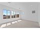 Bright, airy bedroom with ample natural light and plush carpeting, providing a peaceful retreat with great views from the windows at 32535 N 135Th Dr, Peoria, AZ 85383