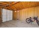 Unfinished garage interior with bicycle at 5502 E Billings St, Mesa, AZ 85205