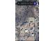 This aerial view showcases residences nestled within expansive lots featuring desert landscaping at 48515 N 13Th Ave, New River, AZ 85087