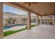 Covered patio with a view of the pool and surrounding landscape at 6005 W Fetlock Trl, Phoenix, AZ 85083