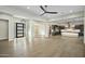Open concept living area showcasing a modern kitchen and hardwood flooring throughout at 8742 E Woodley Way, Scottsdale, AZ 85266