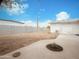 Spacious backyard features a concrete patio and block fence, offering privacy and potential for outdoor living at 634 S Pasadena --, Mesa, AZ 85210