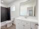 Clean bathroom featuring a modern vanity, neutral gray flooring and a tiled stand-up shower at 634 S Pasadena --, Mesa, AZ 85210