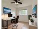 Office with computer, TV, and a window with natural lighting at 634 S Pasadena --, Mesa, AZ 85210
