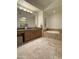 Elegant bathroom featuring granite countertops, custom cabinet, and a soaking tub at 8 E Biltmore Est # 109, Phoenix, AZ 85016