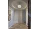 Bright foyer featuring a decorative chandelier and neutral color palette, creating an inviting entrance at 8 E Biltmore Est # 109, Phoenix, AZ 85016