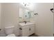 Clean bathroom with a single vanity and toilet at 20251 W Catalina Dr, Buckeye, AZ 85396