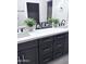 Bathroom countertop with double sinks and 'Laugh' decor at 22205 W Ocupado Dr, Wittmann, AZ 85361