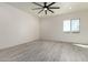 Spacious bedroom with large windows providing ample natural light at 22205 W Ocupado Dr, Wittmann, AZ 85361