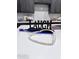 Kitchen countertop decor with wooden beads and the word 