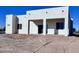 New construction home showcasing a rear patio and stucco exterior at 22205 W Ocupado Dr, Wittmann, AZ 85361