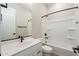 Bathroom with single vanity, tub, and mirror at 20252 W Catalina Dr, Buckeye, AZ 85396