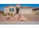 New construction home with attractive landscaping and driveway at 20252 W Catalina Dr, Buckeye, AZ 85396