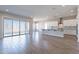 Modern kitchen features island, stainless steel appliances, and white cabinetry at 20252 W Catalina Dr, Buckeye, AZ 85396