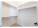 Walk-in closet with hanging space and shelves at 20252 W Catalina Dr, Buckeye, AZ 85396