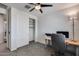 Bedroom with closet, workspace, and ceiling fan at 130 N Bay Dr, Gilbert, AZ 85233