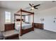 Main bedroom with canopy bed and ceiling fan at 130 N Bay Dr, Gilbert, AZ 85233