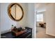 Entryway with mirror and small tray, view into living room at 130 N Bay Dr, Gilbert, AZ 85233