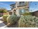 Landscaped front yard of a two-story home at 130 N Bay Dr, Gilbert, AZ 85233