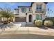 Two story home with attached garage and driveway at 130 N Bay Dr, Gilbert, AZ 85233