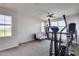 Home gym with various exercise equipment at 130 N Bay Dr, Gilbert, AZ 85233