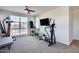 Home gym with elliptical, stationary bike, and weights at 130 N Bay Dr, Gilbert, AZ 85233